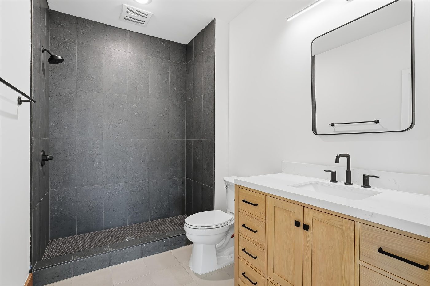 Bathroom with tiled walk-in shower